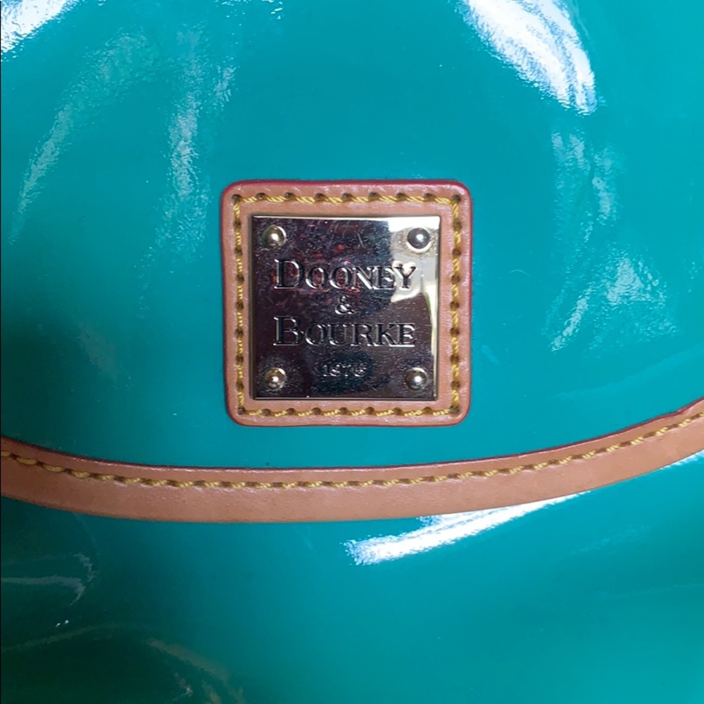 Brand new never used Dooney & Bourke